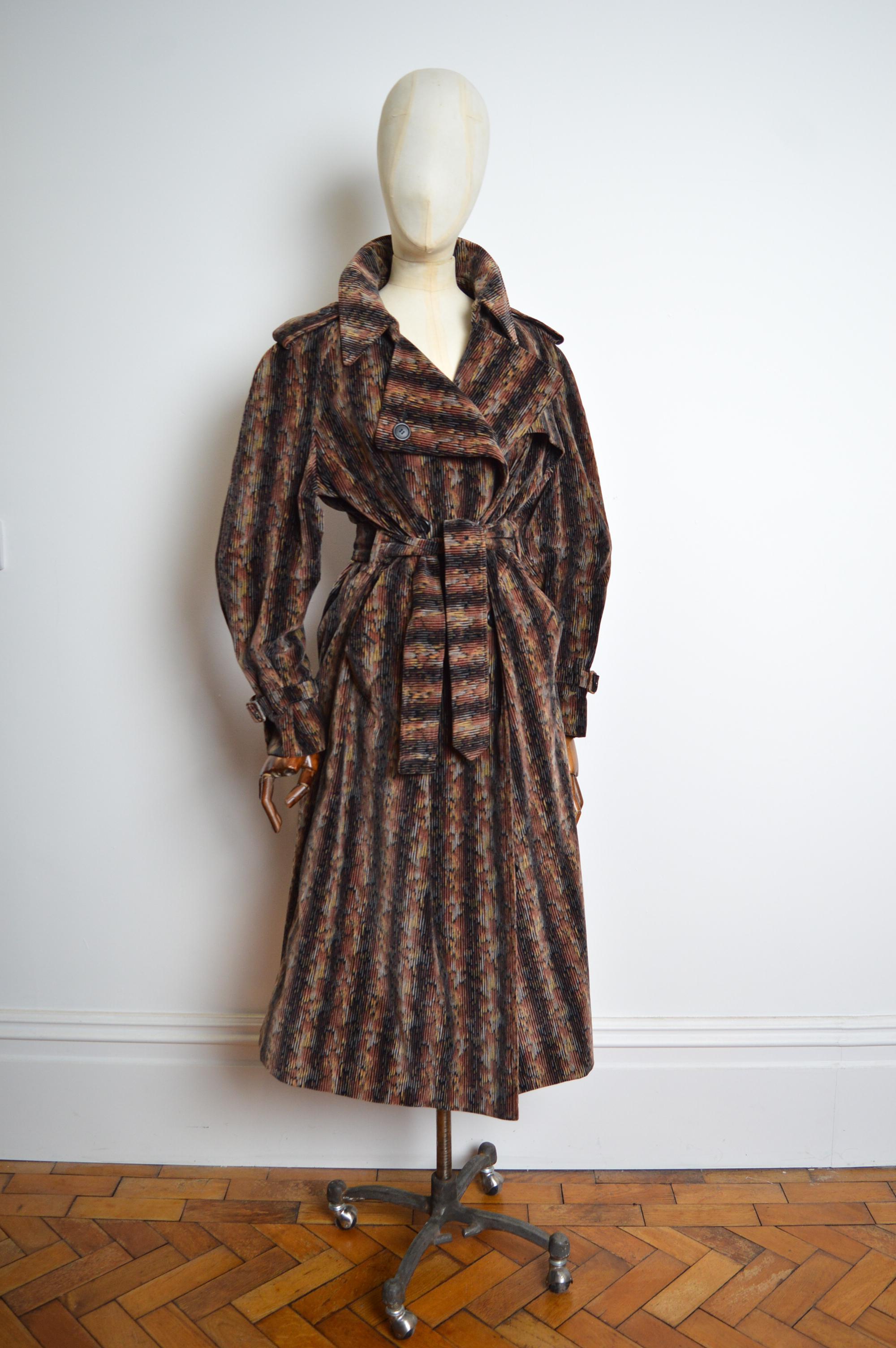 A Superb, Vintage Burberry Trench Coat circa 1970 crafted in England from the most unusual psychedelic Velvet chenille fabric, complete with the original waist belt !
Size; ONE SIZE (depending on desired fit - for reference our mannequin is a uk 6