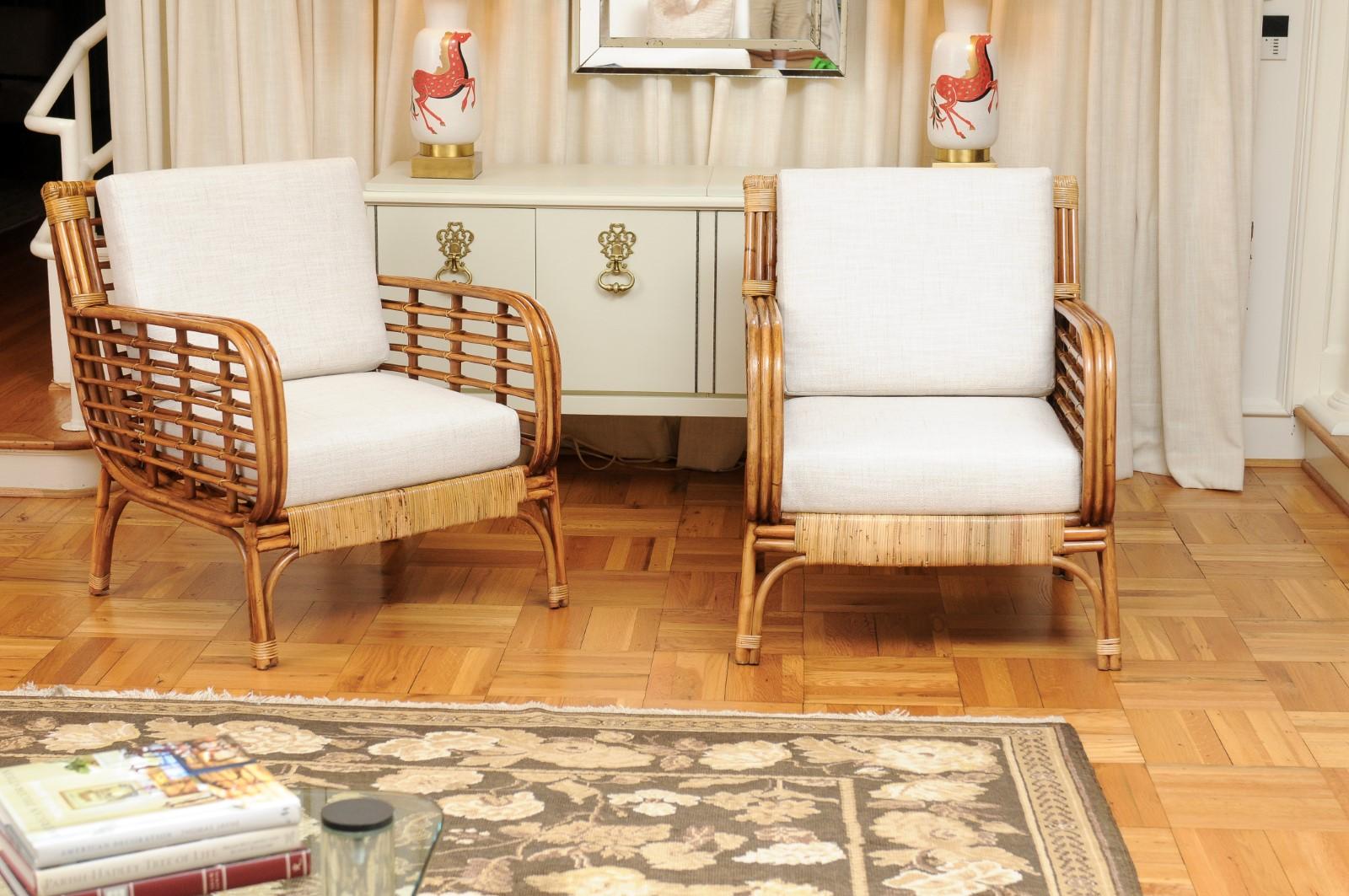 These magnificent lounge chairs are shipped as professionally photographed and described in the listing narrative: Meticulously professionally restored and installation ready. Expert custom upholstery service is available.

A fabulous pair of