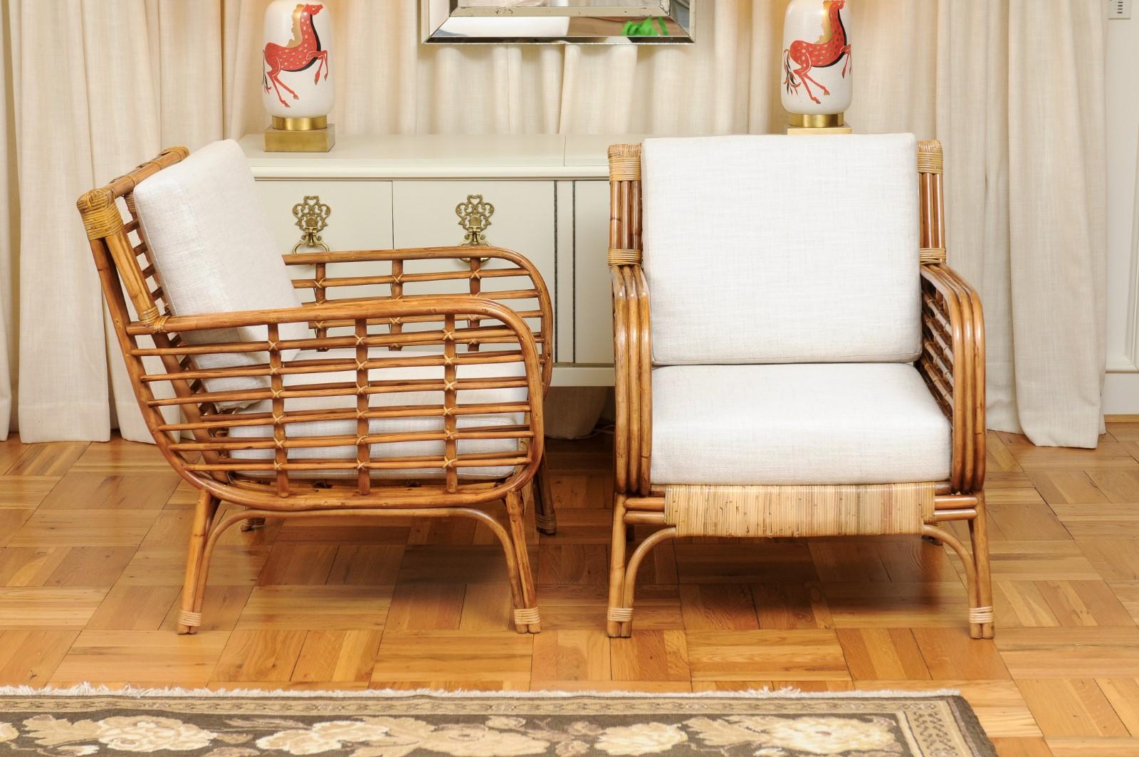 Mid-20th Century Fabulous Restored Pair of Birdcage Style Rattan and Cane Loungers, circa 1955