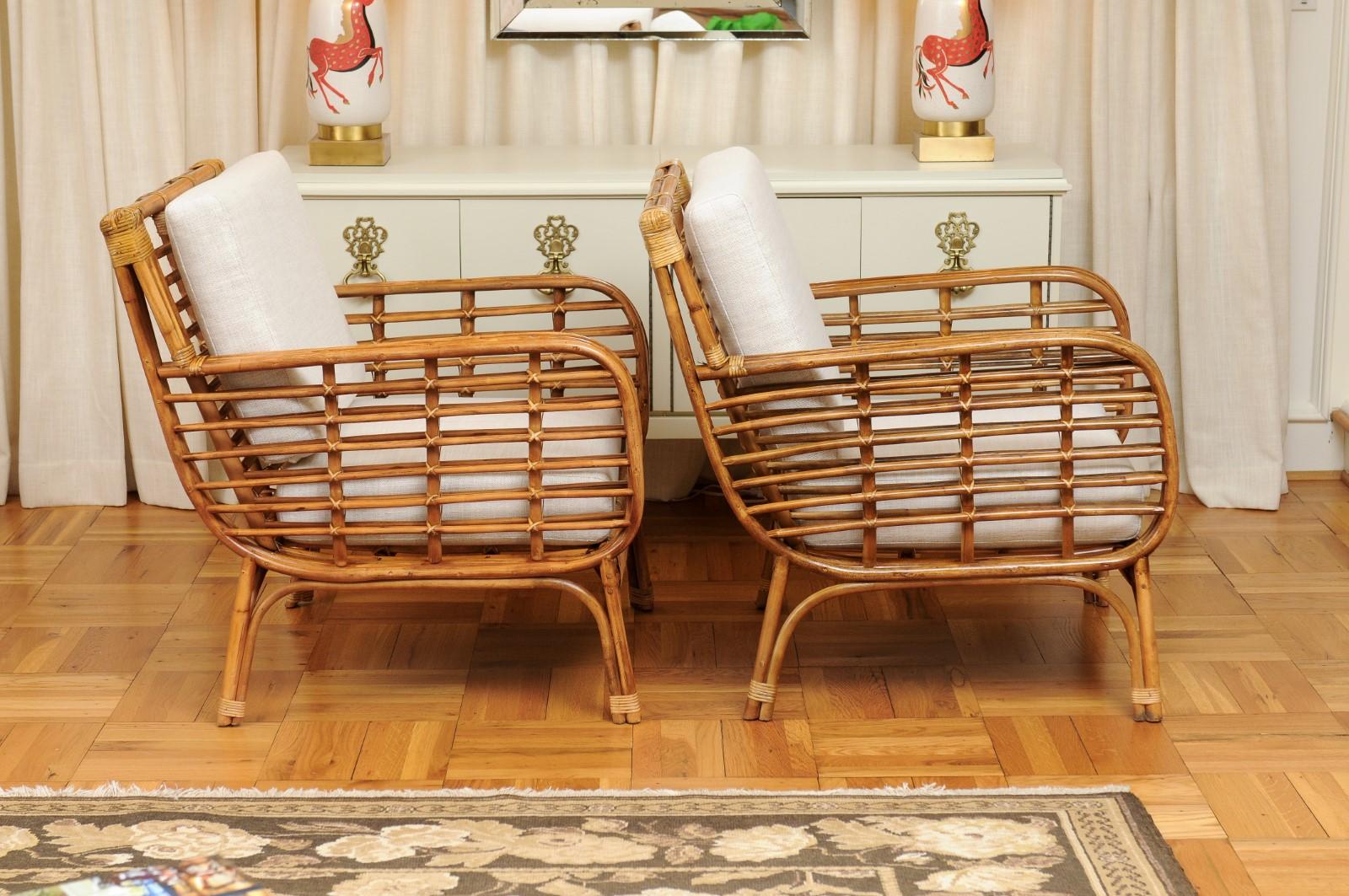 Fabulous Restored Pair of Birdcage Style Rattan and Cane Loungers, circa 1955 1