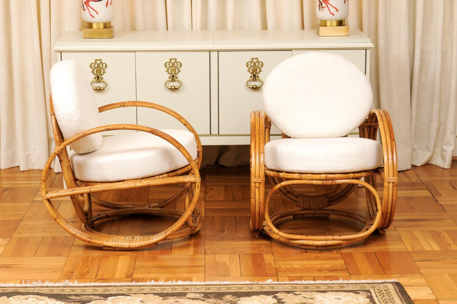 Canne Fabuleuse paire de chaises longues Circles en rotin et rotin de canne restaures, France, vers 1950 en vente
