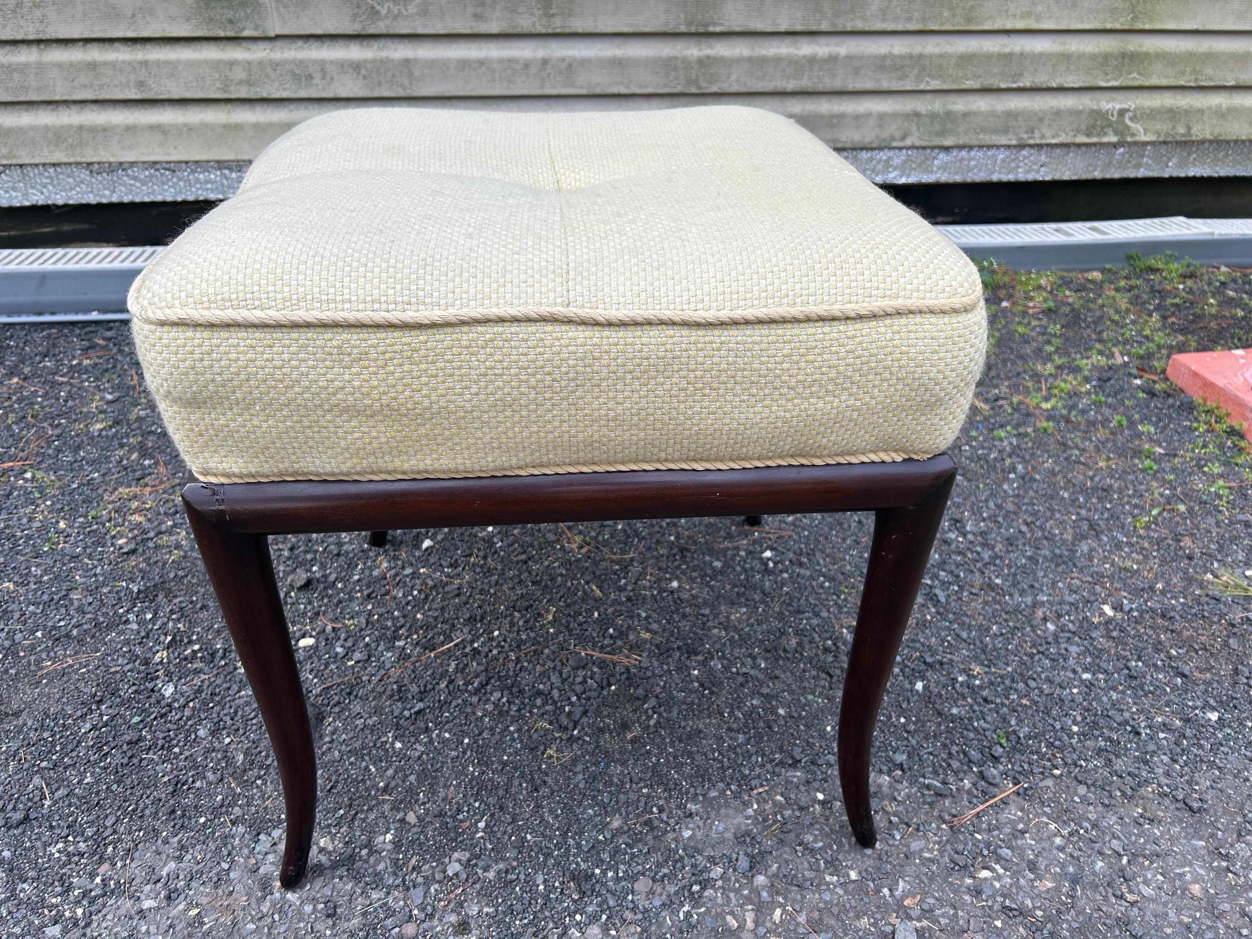 Fabulous upholstered stool/ottoman with walnut frame. Designed by T.H. Robsjohn-Gibbings for Widdicomb.
American, c. 1950  This piece measures 20