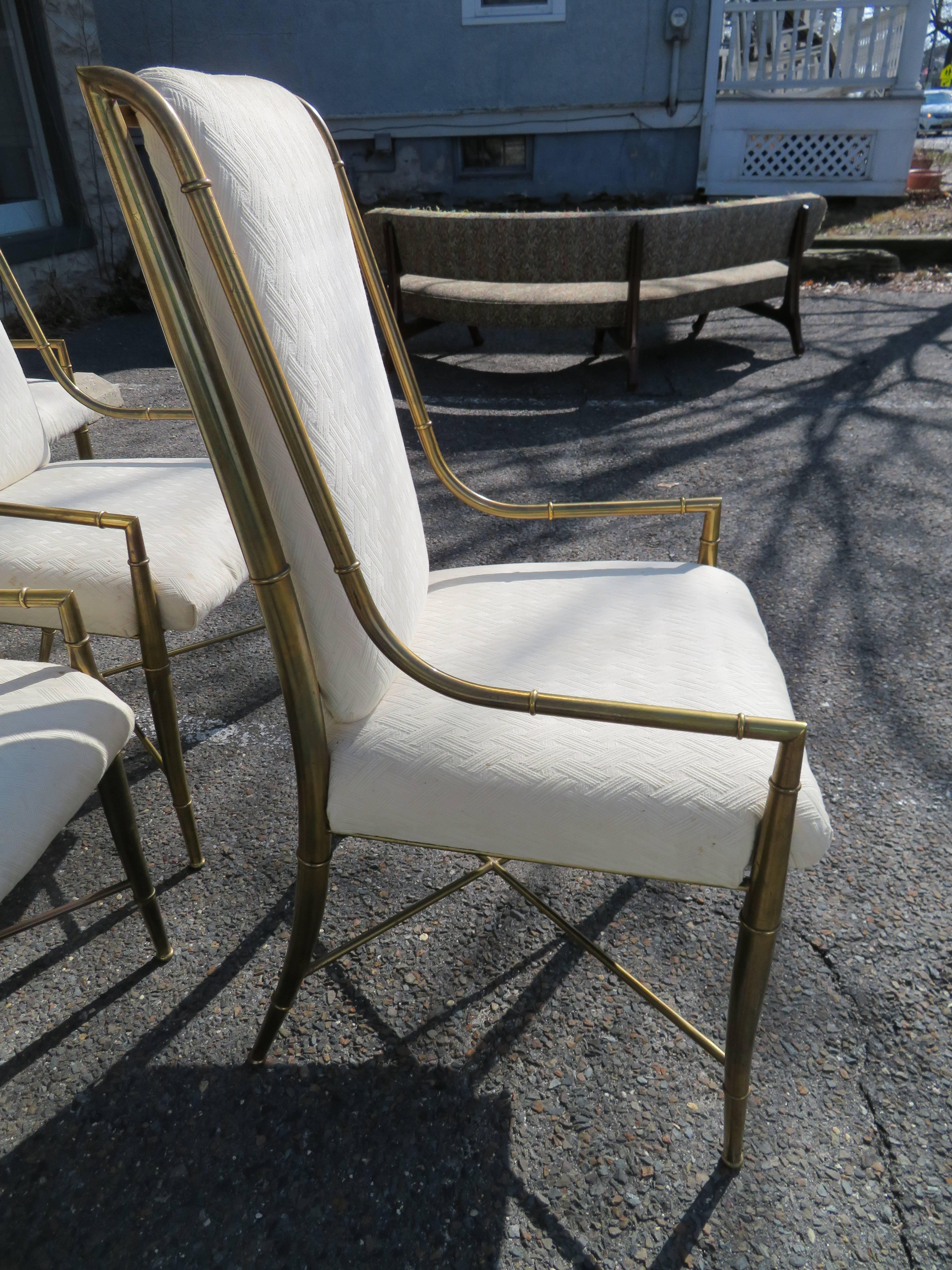 Magnificent set of six Mastercraft brass faux bamboo armchairs.
Chairs are in very nice vintage condition with the brass having a wonderful time aged warm patina. The upholstery is worn and dated-new upholstery is recommended.