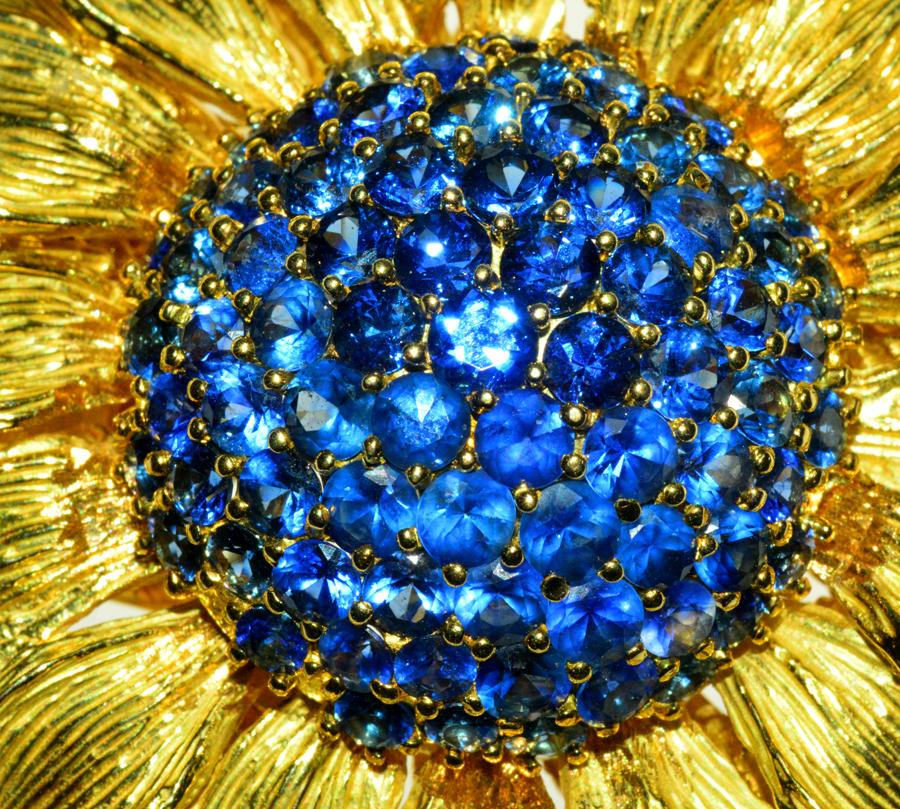 FabulousValentin Magro sunflower brooch with a gorgeous cluster of Ceylon sapphires in the center.  18K yellow gold bursting with beauty!