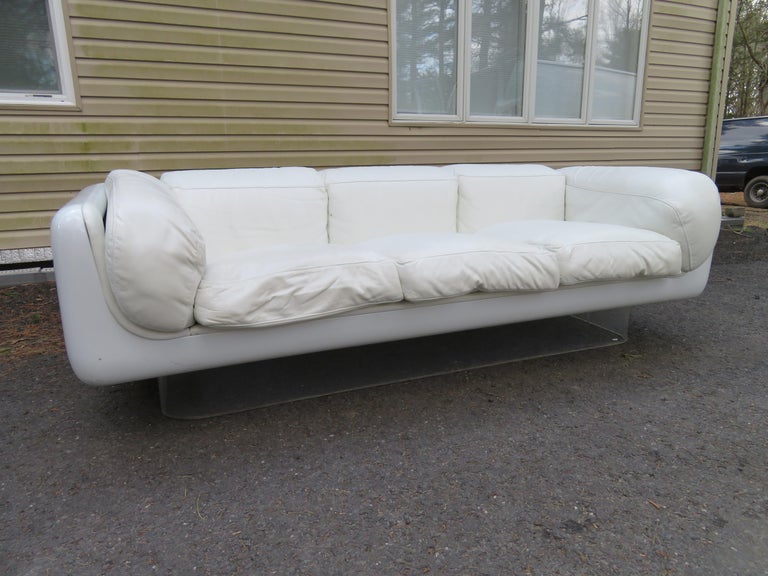 One of the iconic designs of the Space Age modern movement is this awesome and uber rare Steelcase fiberglass, leather and Lucite sofa. Previously attributed to Warren Platner but now to William Andrus, this is a single owner sofa, we do have the