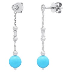 Fabuleuses boucles d'oreilles en or blanc et diamants avec turquoise pour elle