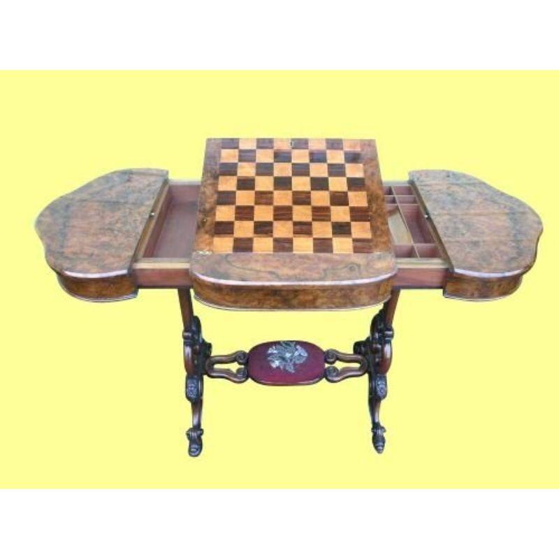Fabulous quality unusual Victorian burr walnut antique games table and desk {Both ends pull out and games board lifts as writing slope

c1860 37ins x 20ins x 29ins high

Declaration: This item is antique. The date of manufacture has been