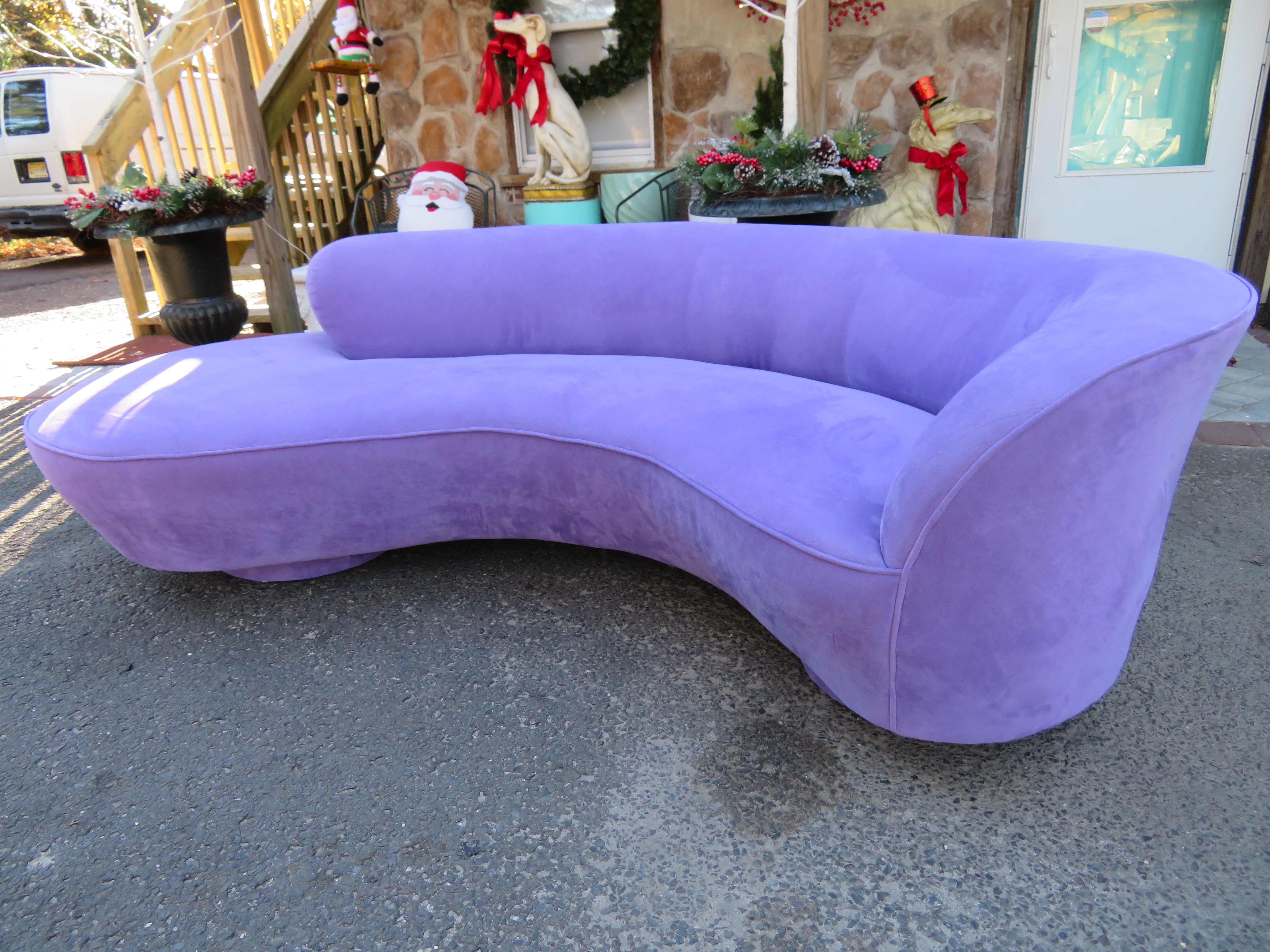 Fabulous vintage cloud sofa by Vladimir Kagan for directional with desired lucite support. Sofa retains original purple ultra-suede upholstery which presents very well.