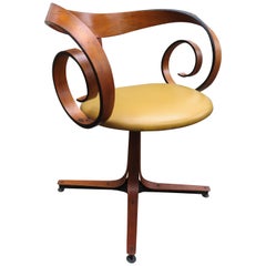 Fabulous Walnut "Scroll" Swivel Armchair by George Mulhauser Plycraft