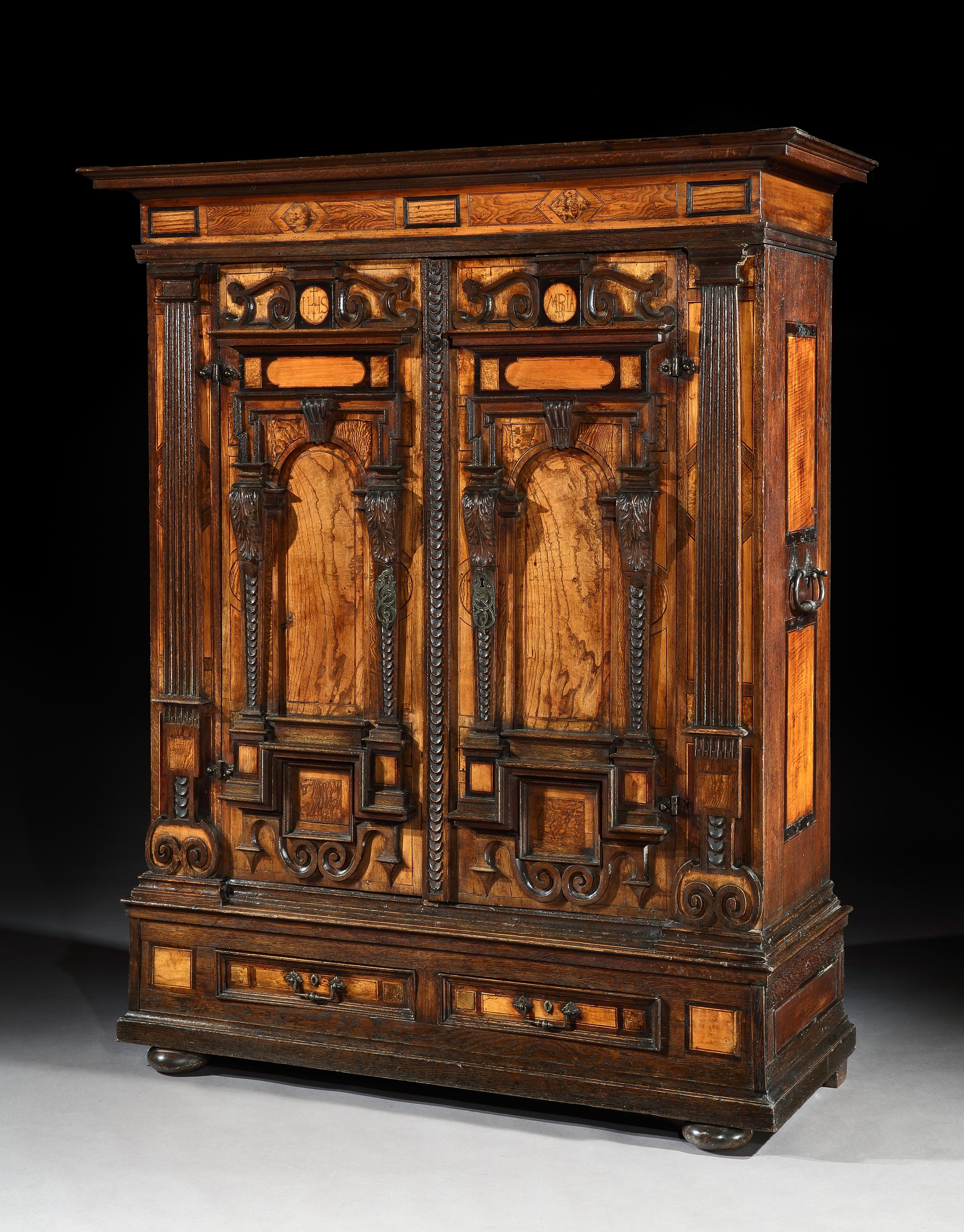 An Exceptional, Museum Quality, Mannerist, German, Façade Cabinet or Fassadenschrank in three sections

The ultimate status symbol and feat of mannerist cabinetmaking, this Fassadenschrank incorporates layers of inlay of different woods prized for
