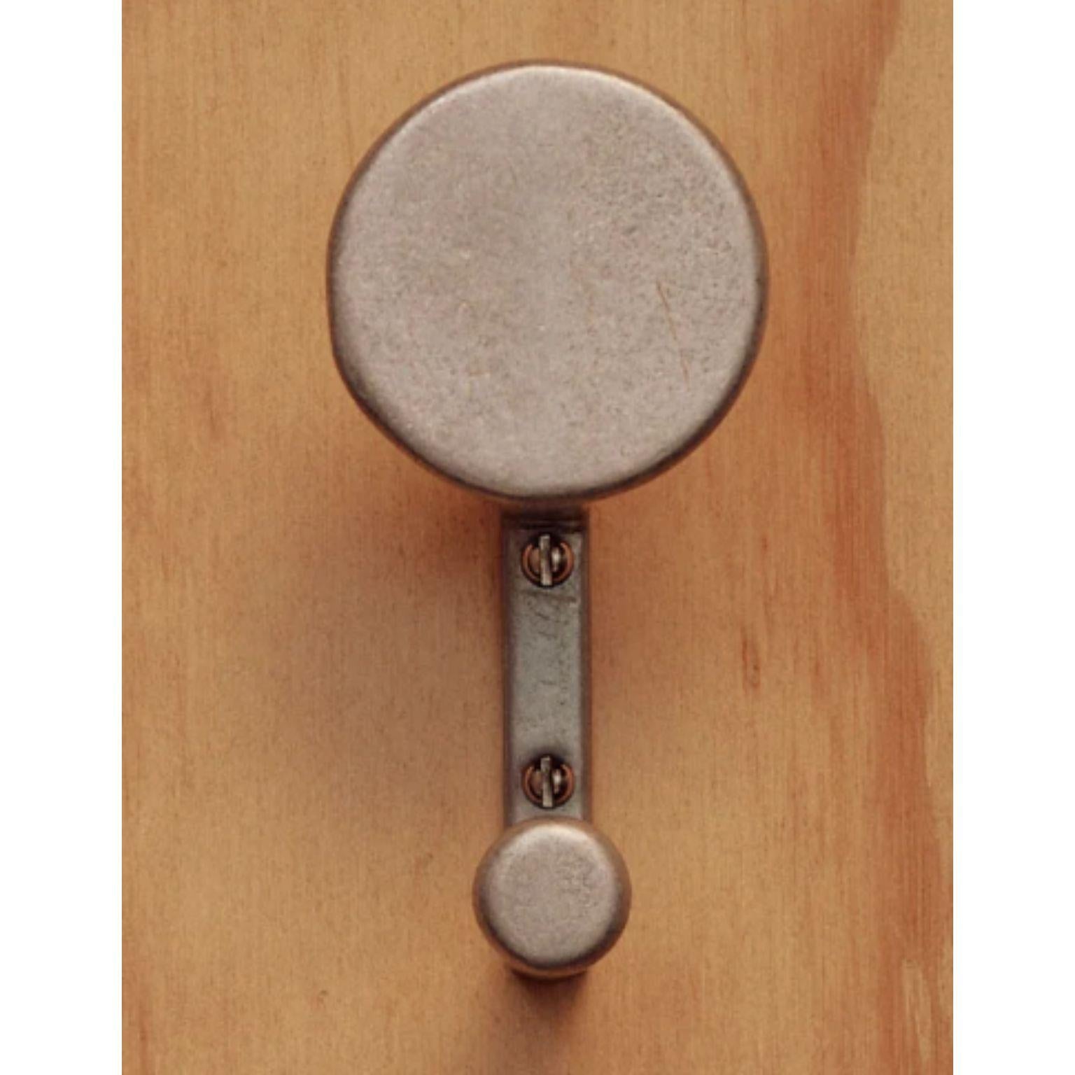F.ACE WALL HOOK ALUMINIUM by Henry Wilson
Dimensions: D7 x W5.5 x H8.9 cm
Materials: Aluminium 

The F.ACE Hook is a riff on our popular compass Hook. It is sand cast in solid Aluminium and features a full disc for the main hanging point.