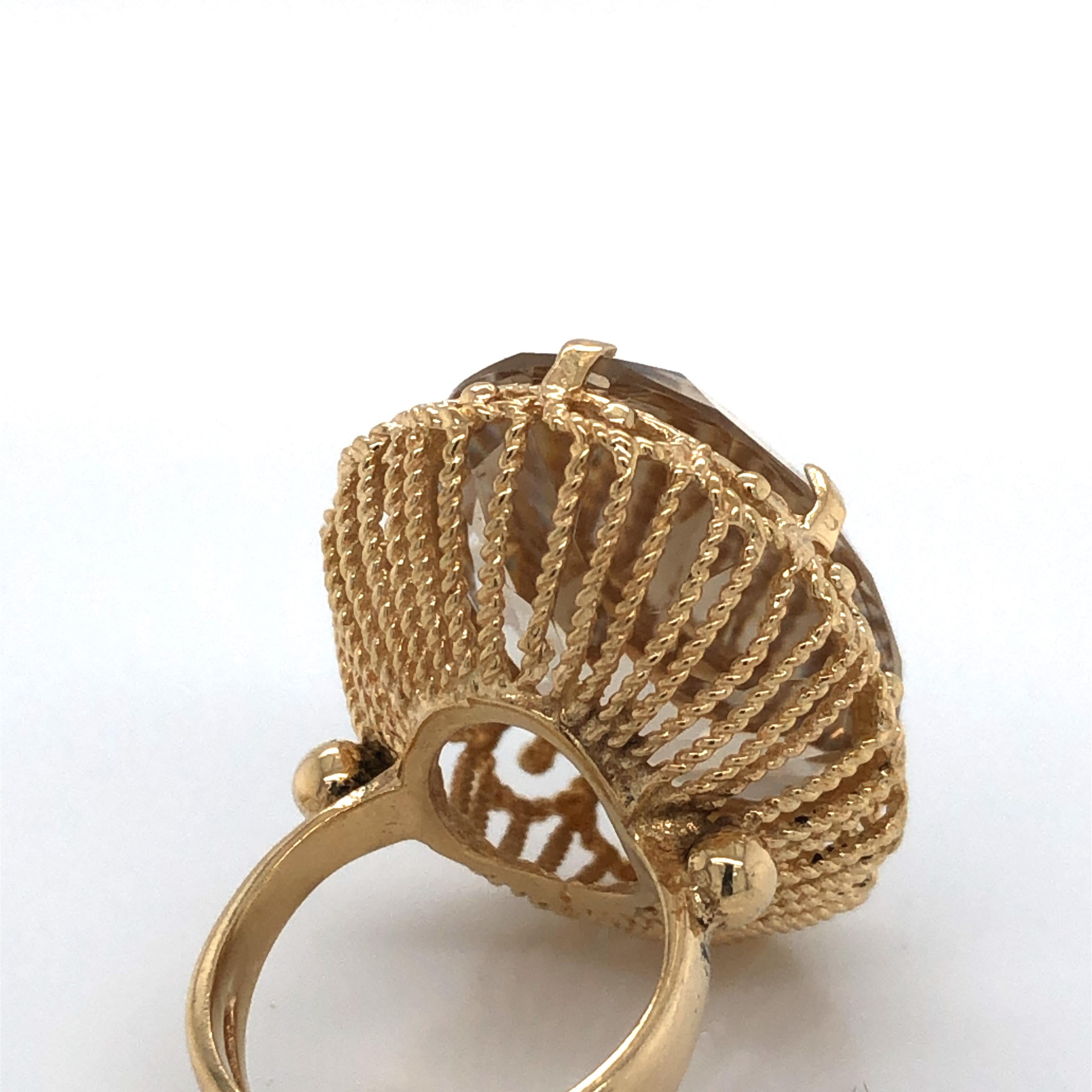 Oval Cut Twenty Five Carat Smokey Quartz 10 Karat Gold Cocktail Ring For Sale