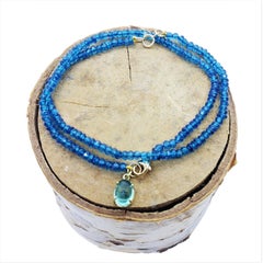 Faceted Apatite Beads with Blue Tourmaline Cabochon set in 18K and Lobster Clasp