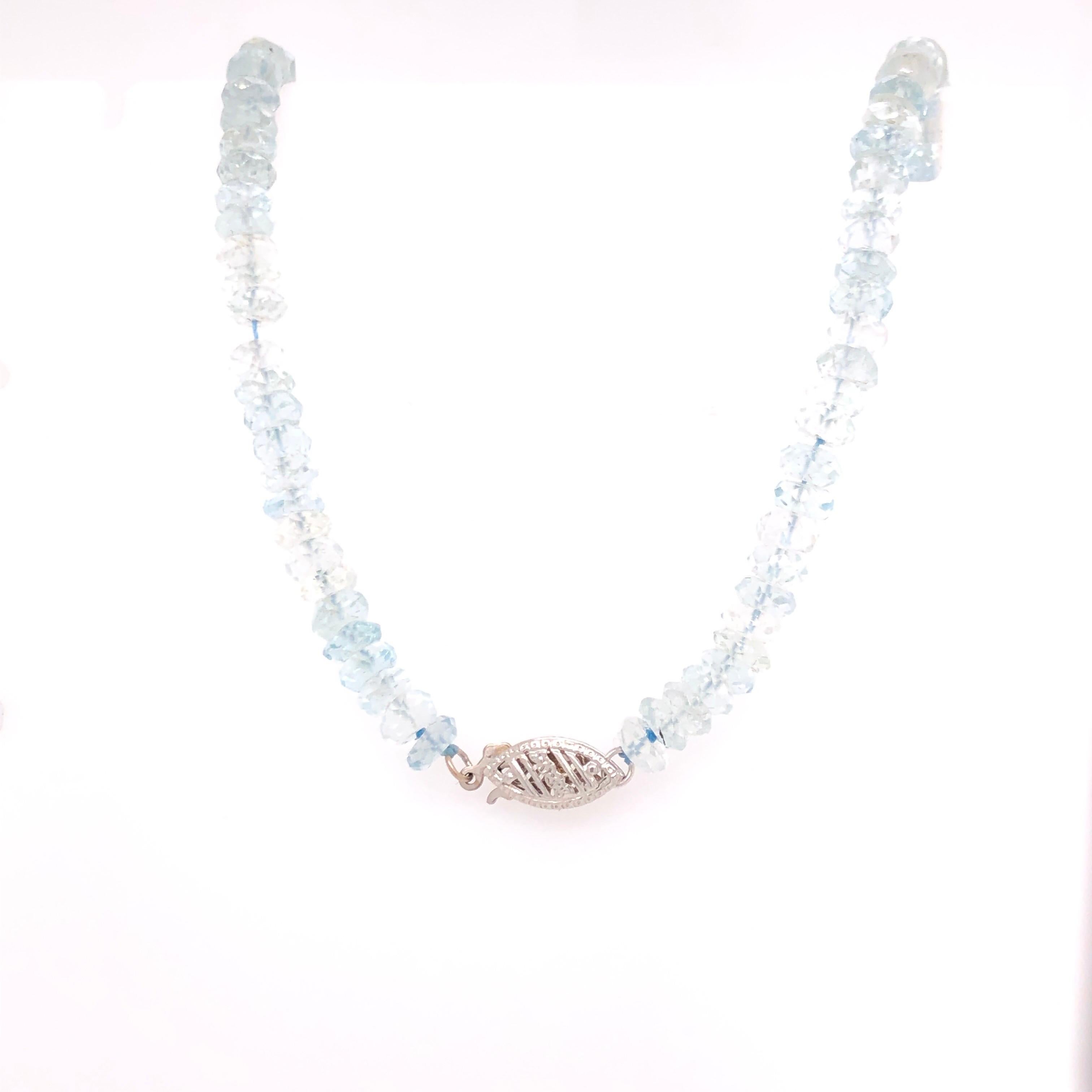 Like the color of the sky where it meets the horizon, the delicate color of this simple but elegant faceted aquamarine necklace is accented by 4 14K white gold diamond stations with an approximate total weight of 0.1 CTs of melee diamonds. 

This