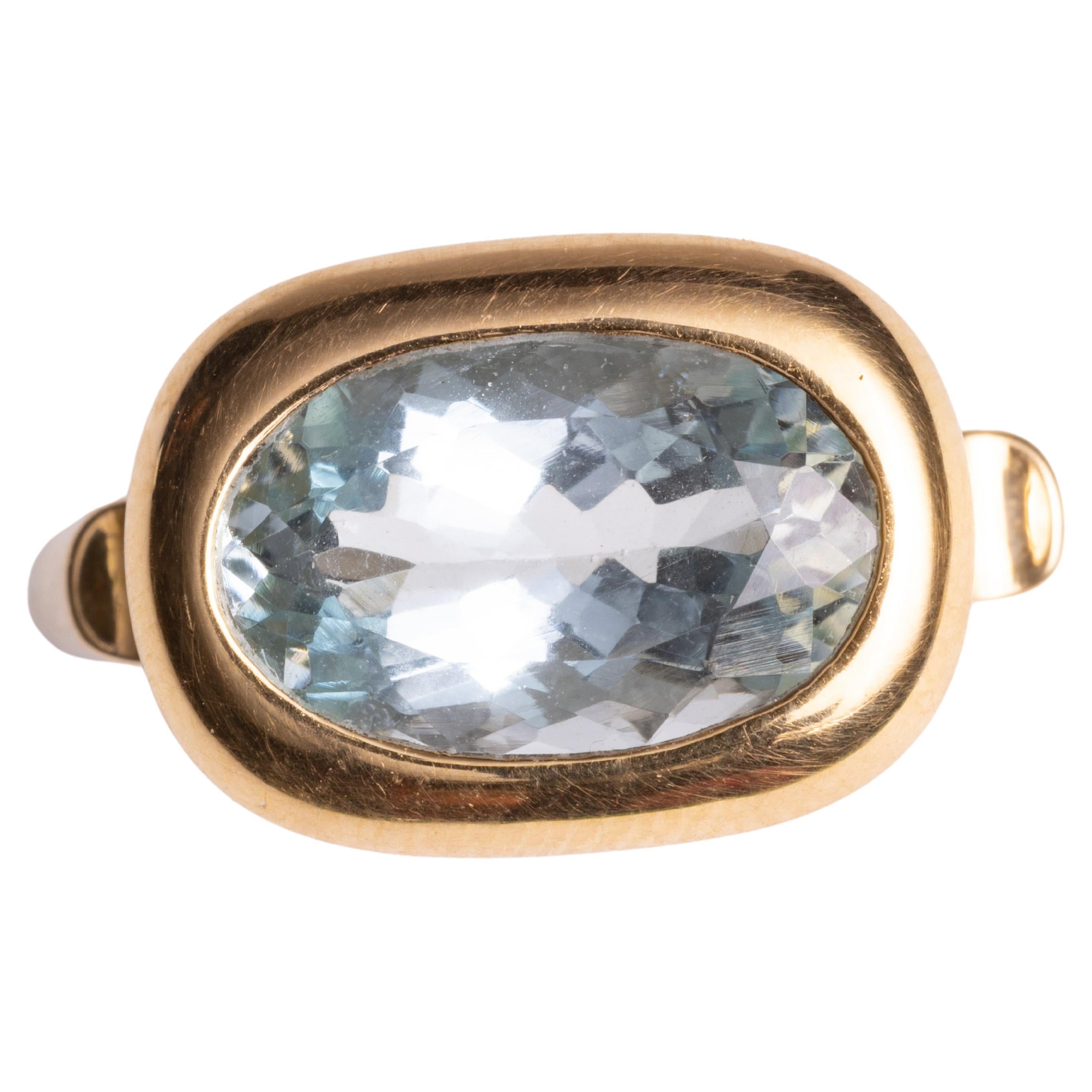 A beautiful, translucent blue, faceted oval aquamarine set in a combination of 18K gold and sterling silver.  This is a weighted gold, not plated.  Ring size is a 7.

The fine jewelry collection is sourced, designed or created by Deborah Lockhart