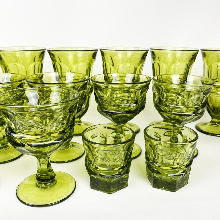 https://a.1stdibscdn.com/faceted-avocado-green-kings-crown-indiana-thumbprint-stem-glasses-set-of-19-for-sale-picture-2/f_33823/f_233820721618529858269/Green_Glass_Set_1_master.jpg?width=768