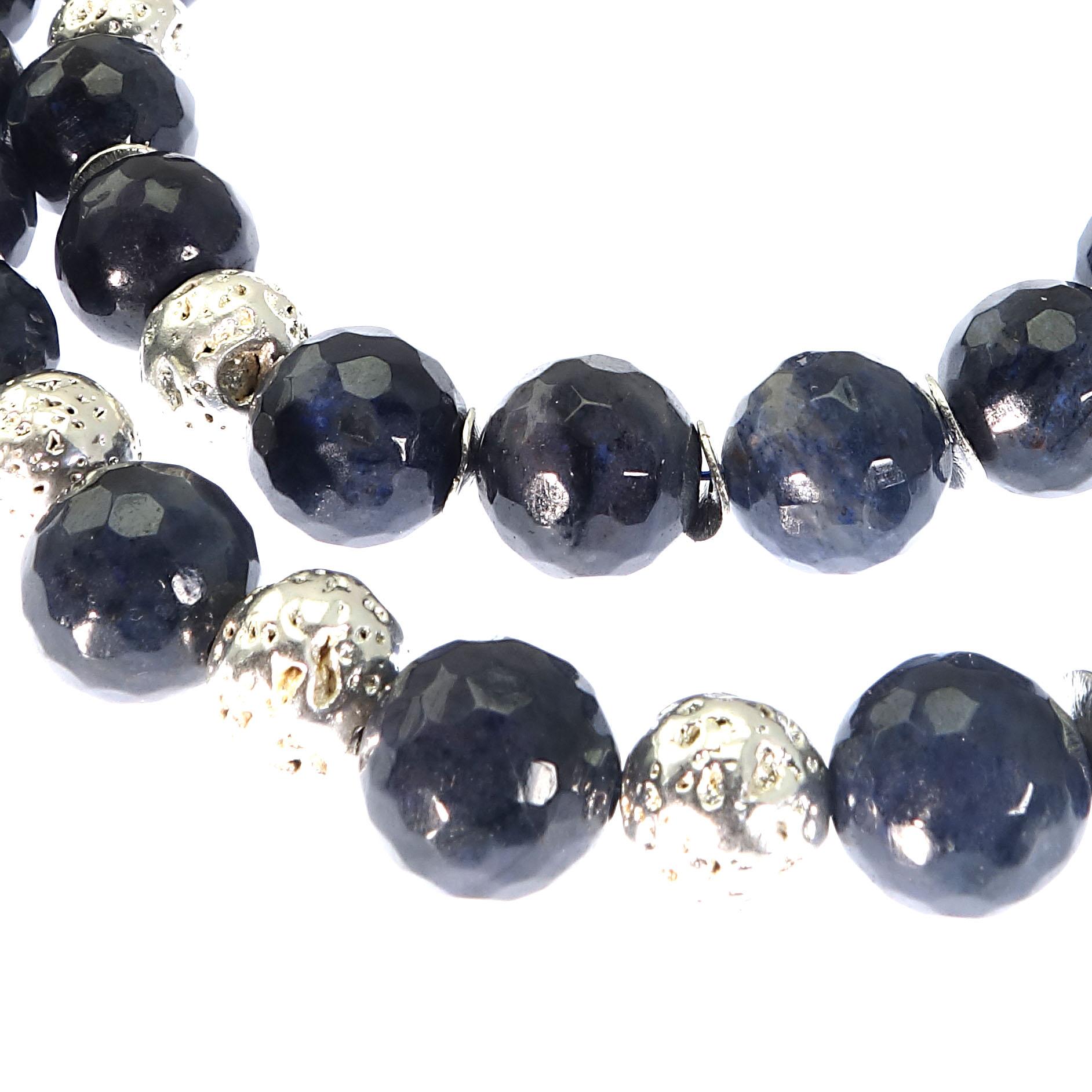 Handmade necklace of highly polished, faceted blue Dumortierite enhanced with sparkling silver 'lava' beads and silver tone flutters. This double strand necklace is a must have for all you blue lovers. Dumortierite ranges from lighter blue to dark