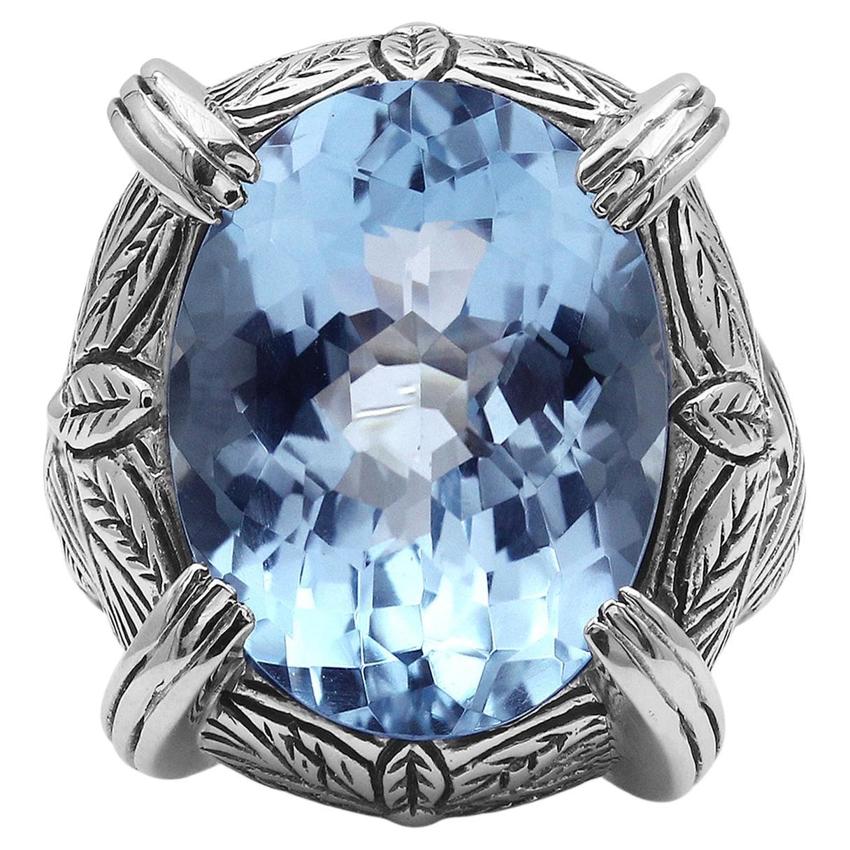 Faceted Blue Topaz Ring in Engraved Sterling Silver For Sale
