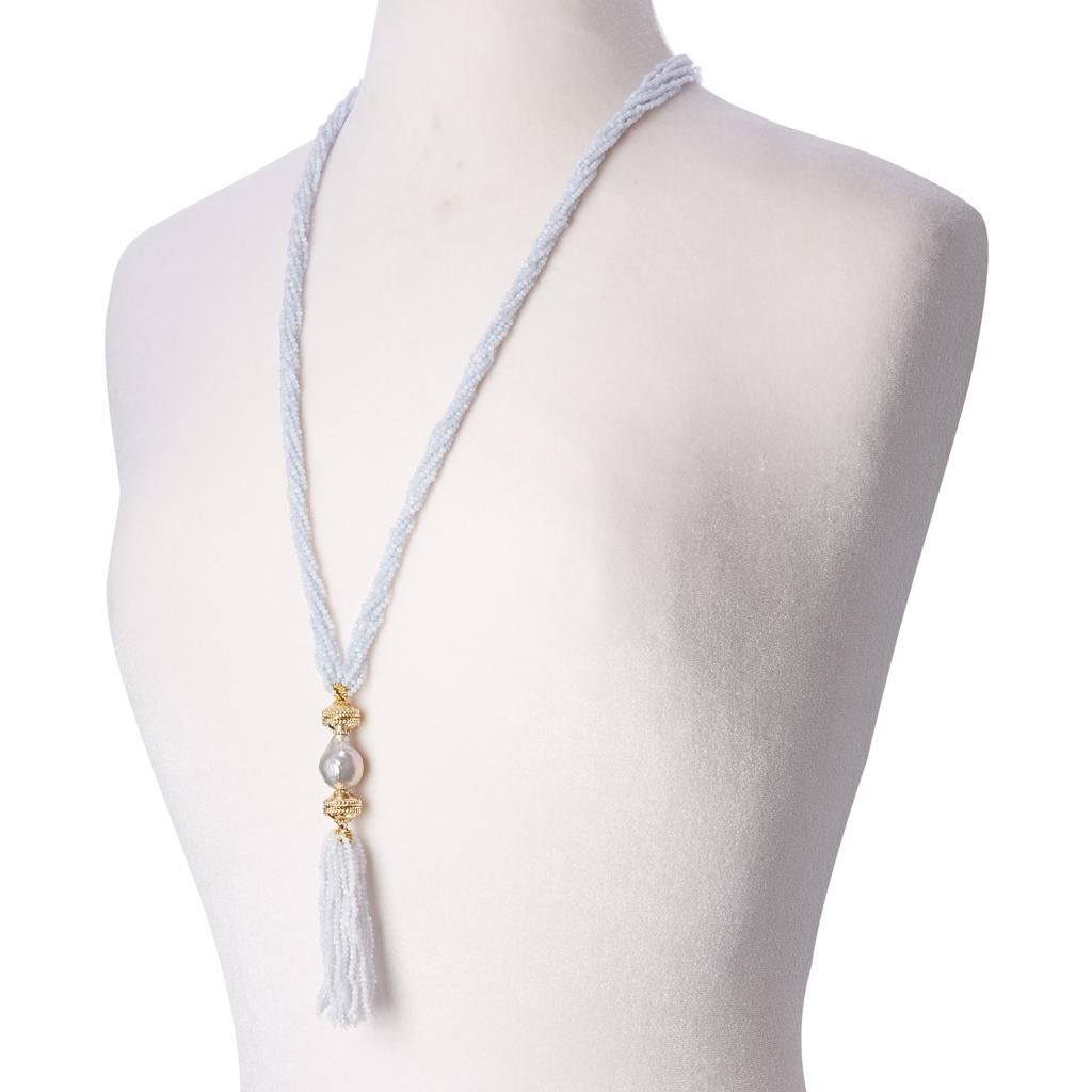 Hand-strung, 26 strand tassel featuring 2mm faceted chalcedony stones and our signature 14K plated yellow gold magnetic tassel clasp. 

Enhance the look of any multi-strand magnetic Clara Williams necklace by adding this bold, glamourous