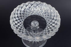 Faceted compote in clear crystal glass with star-patterned rim. 1930s/40s