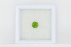 Faceted demantoid garnet, 0.48 ct