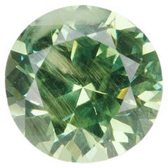 Faceted demantoid garnet, 0.5 ct