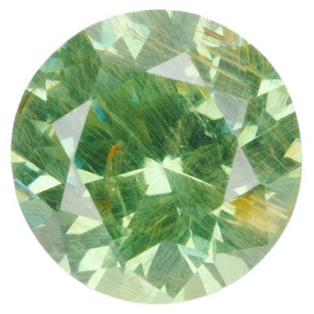 Faceted demantoid garnet, 0.63 ct For Sale