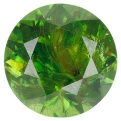 Faceted demantoid garnet, 0.65 ct