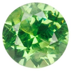 Faceted demantoid garnet with good color and dispersion, 0.46 ct