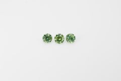 Faceted demantoid set, 0.93 ct