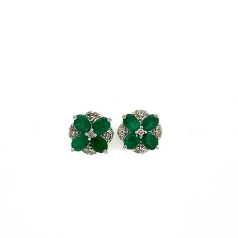 Oval Cut Faceted Emerald Diamond Flower Stud Earrings Crafted in Sterling Silver For Sale