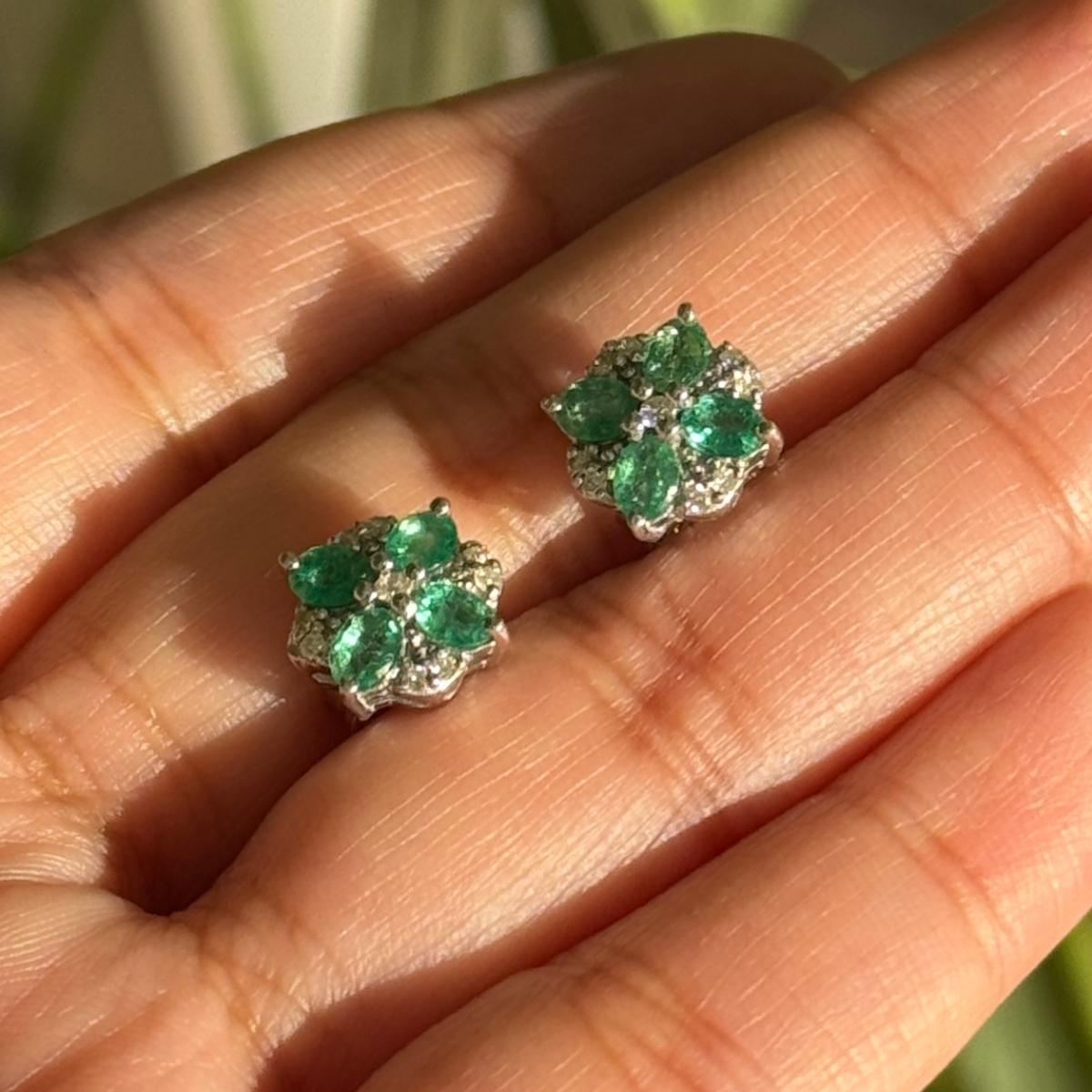 Women's Faceted Emerald Diamond Flower Stud Earrings for Mom Crafted in Sterling Silver For Sale