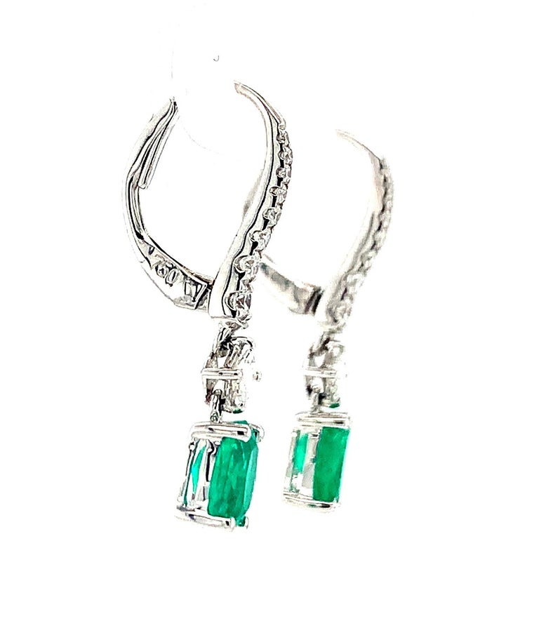 Artisan Faceted Emerald Oval and Diamond Line, White Gold Elongated Drop Earrings For Sale