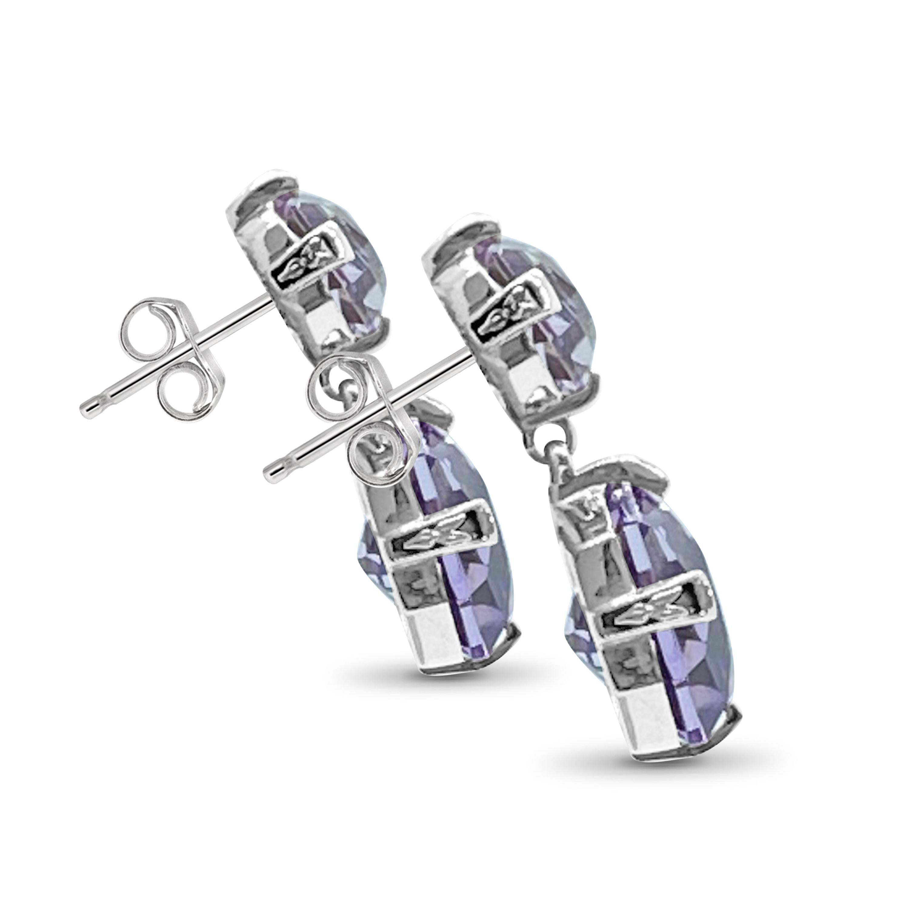 Embark on a celestial journey with the Faceted Galactical Amethyst Double Drop Earring from Stephen Dweck's distinguished Galactical Collection. Crafted with precision in 925 sterling silver and measuring at 1.15