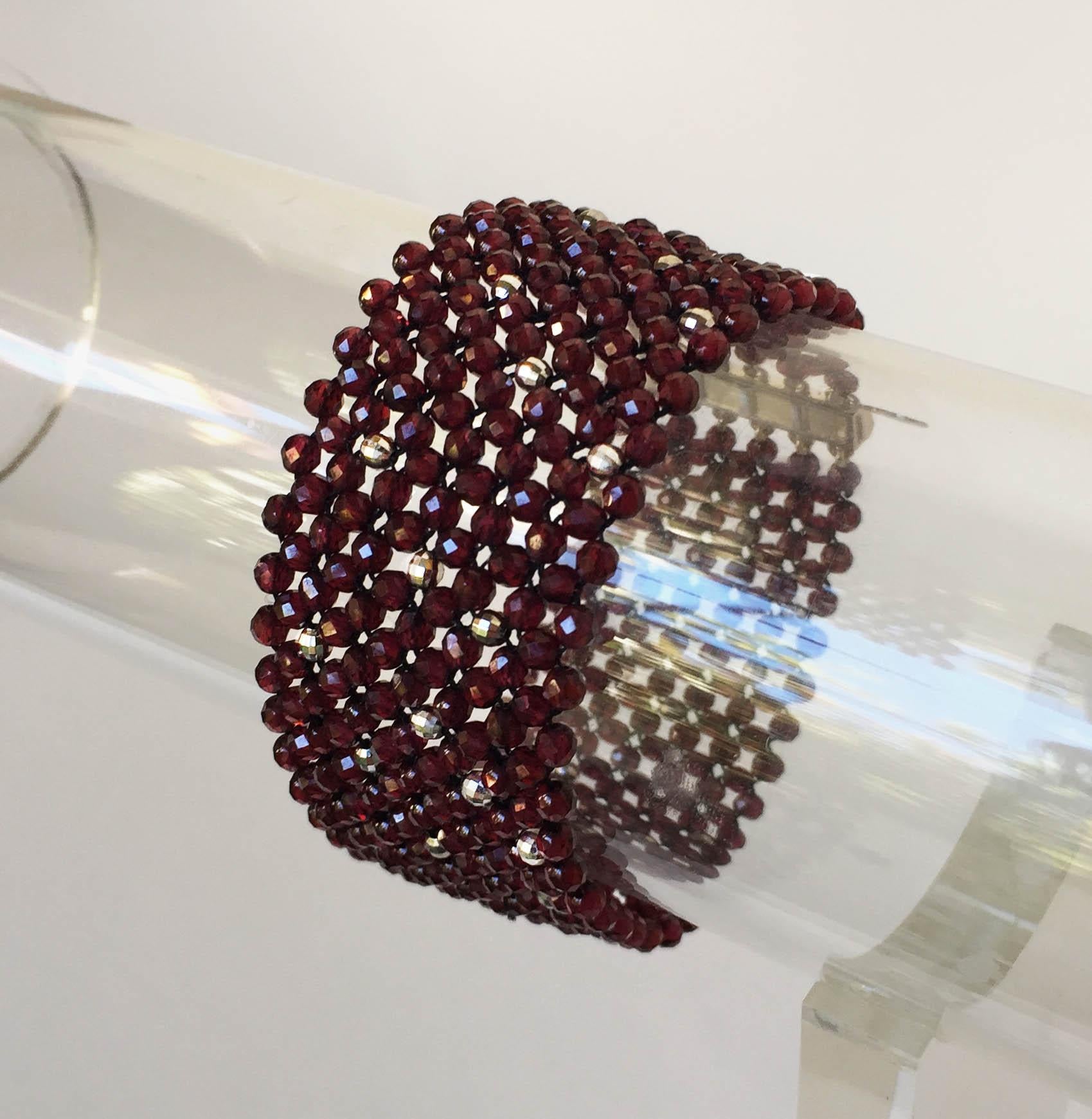 Artist Marina J. Bracelet of Woven Faceted Garnet beads and Sterling Silver Clasp  For Sale