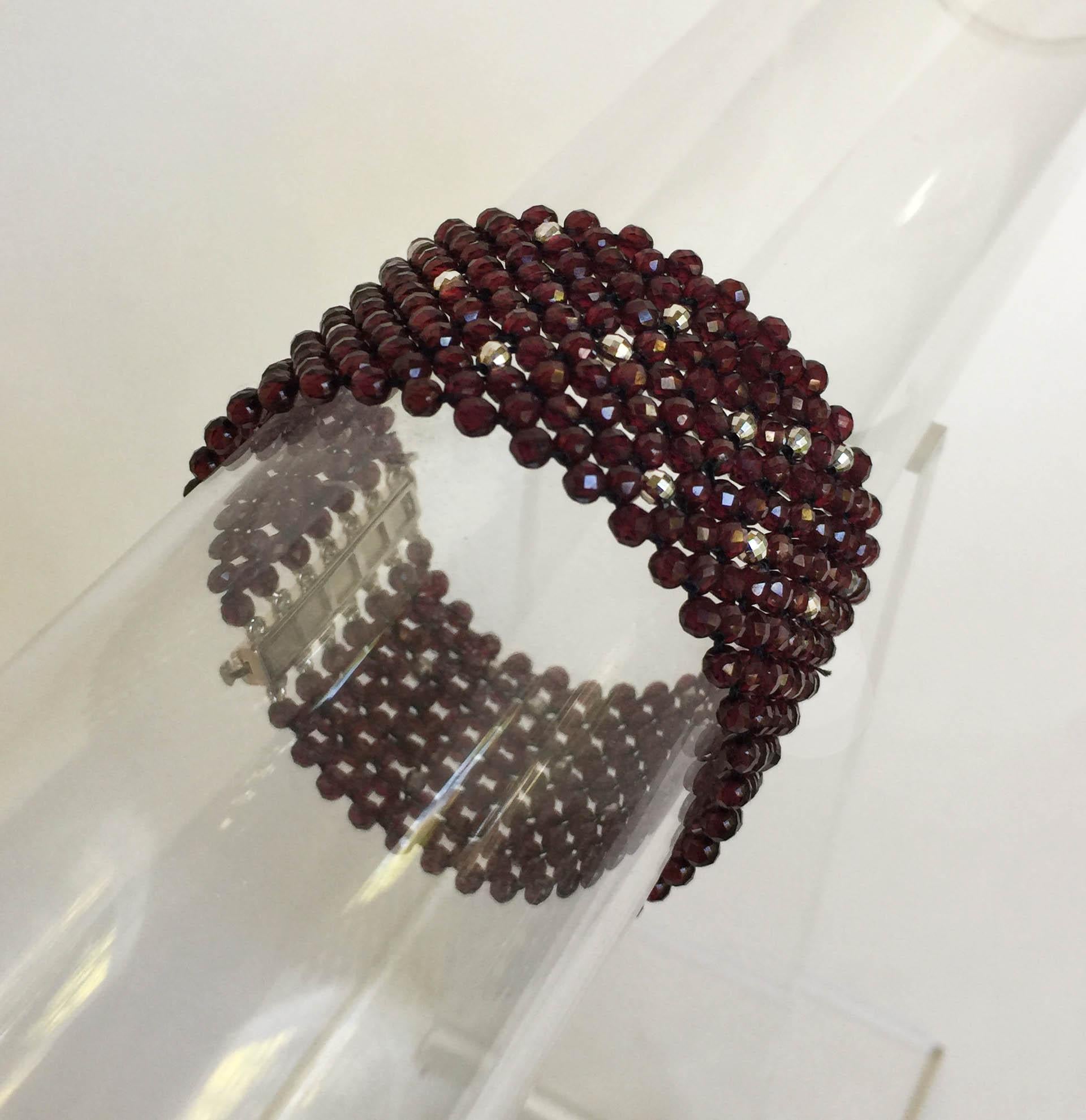 Bead Marina J. Bracelet of Woven Faceted Garnet beads and Sterling Silver Clasp  For Sale