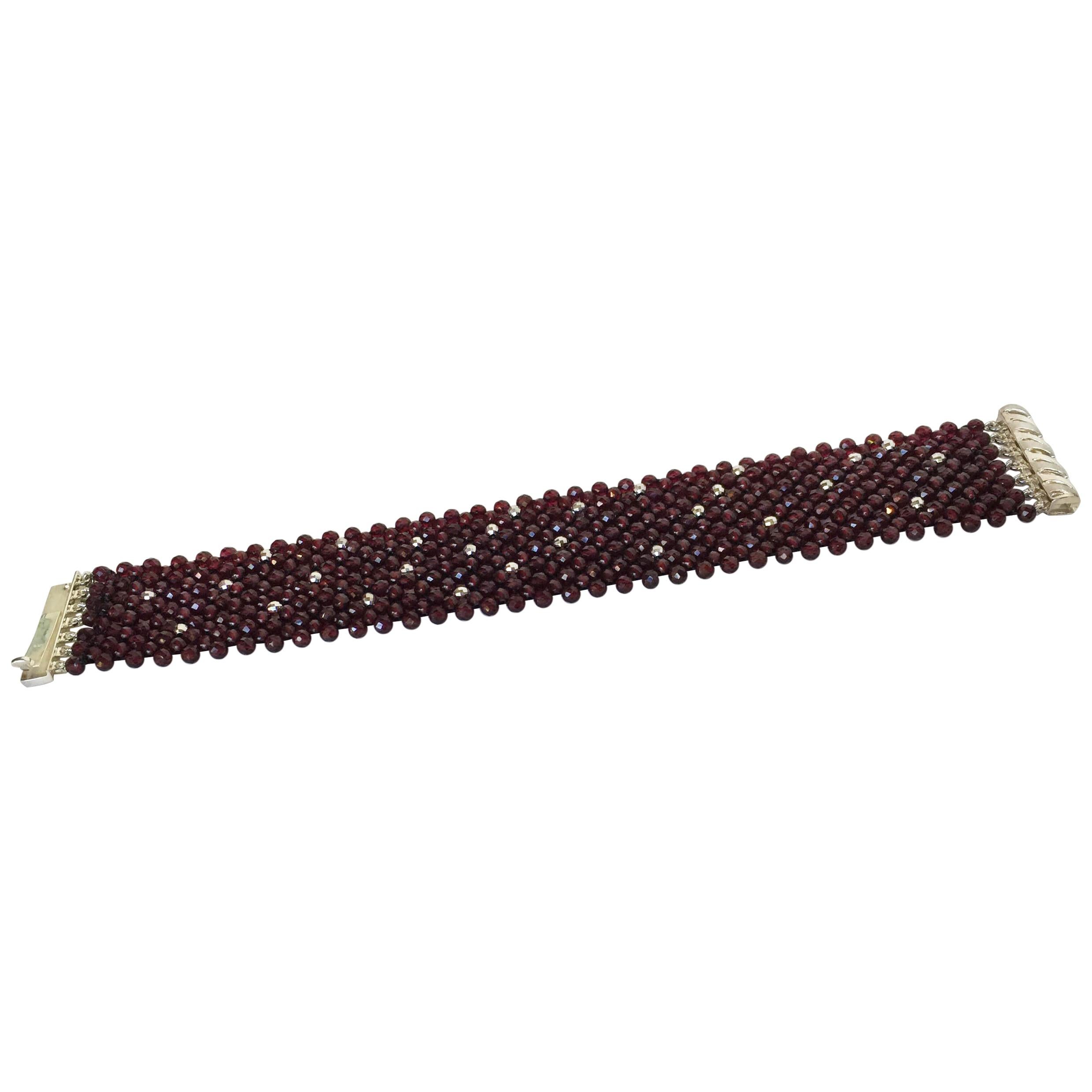 Marina J. Bracelet of Woven Faceted Garnet beads and Sterling Silver Clasp  For Sale