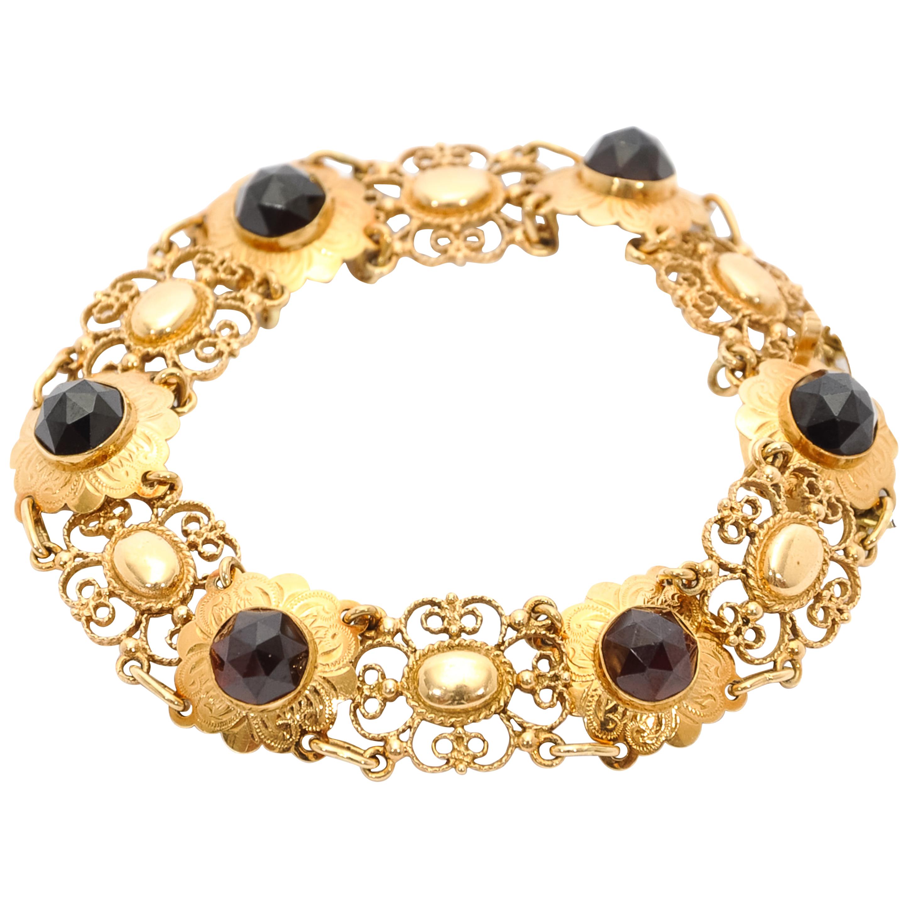 14 Karat Gold Garnet Openwork Link Bracelet For Sale