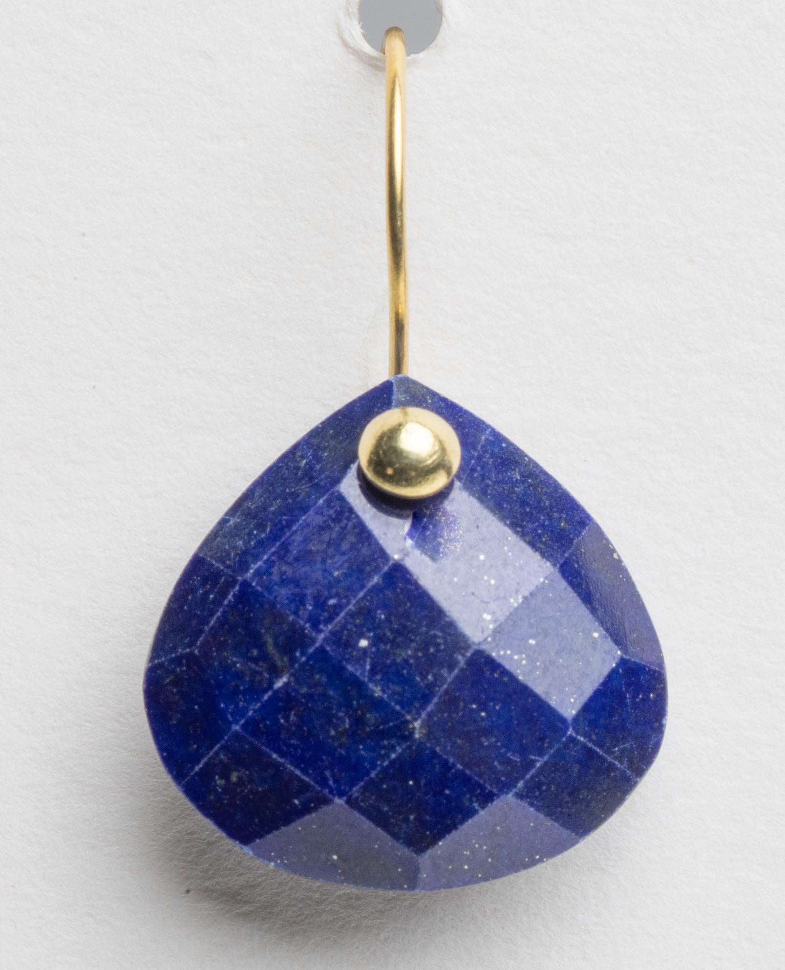 A pair of cushion cut, pear-shaped lapis lazuli drop earrings with 18K gold ear wires.  For pierced ears.