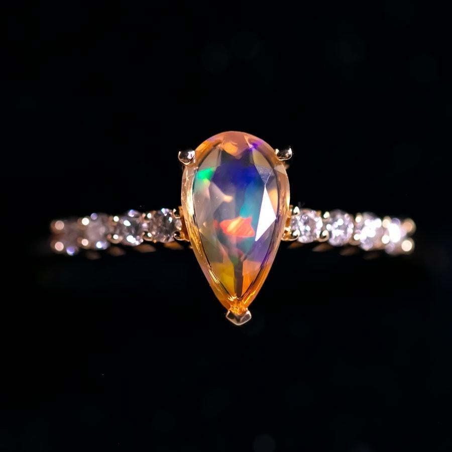 Rare Faceted Mexican Fire Opal & Diamond Engagement Ring 18K Yellow Gold.


Free Domestic USPS First Class Shipping!  Free One Year Limited Warranty!  Free Gift Bag or Box with every order!



Opal—the queen of gemstones, is one of the most
