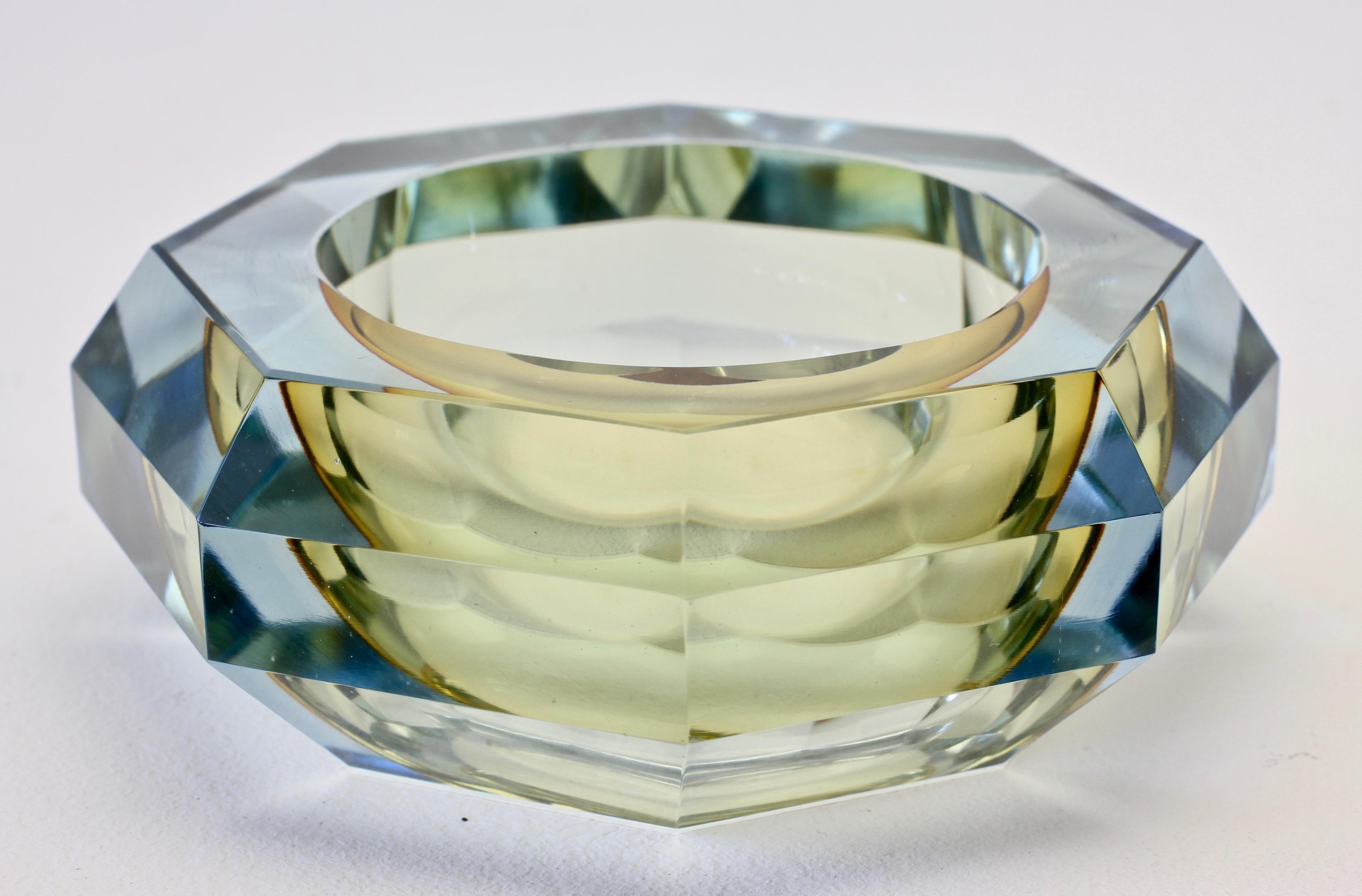 Large vintage Italian midcentury Murano multifaceted art glass bowl attributed to Mandruzzato, circa 1970s. The combination of amber toned and light blue tinted or clear 'Sommerso' cut-glass looks simply stunning.

The early work of Mandruzzato is