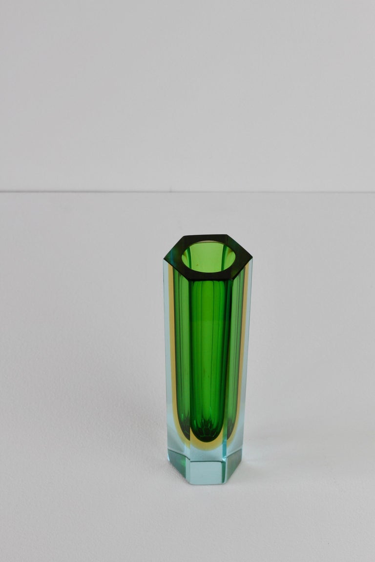 Gorgeous vintage Italian faceted Murano glass vase attributed to Mandruzatto, circa 1960s. A rare and absolutely lovely color combination of emerald green to yellow to light blue 'Sommerso' or 'Submerged' glass.