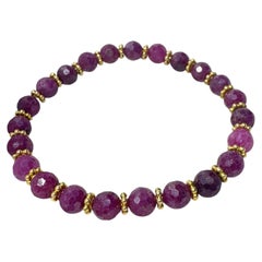 Perline di rubino naturale sfaccettato e perline d'oro 22k Mala