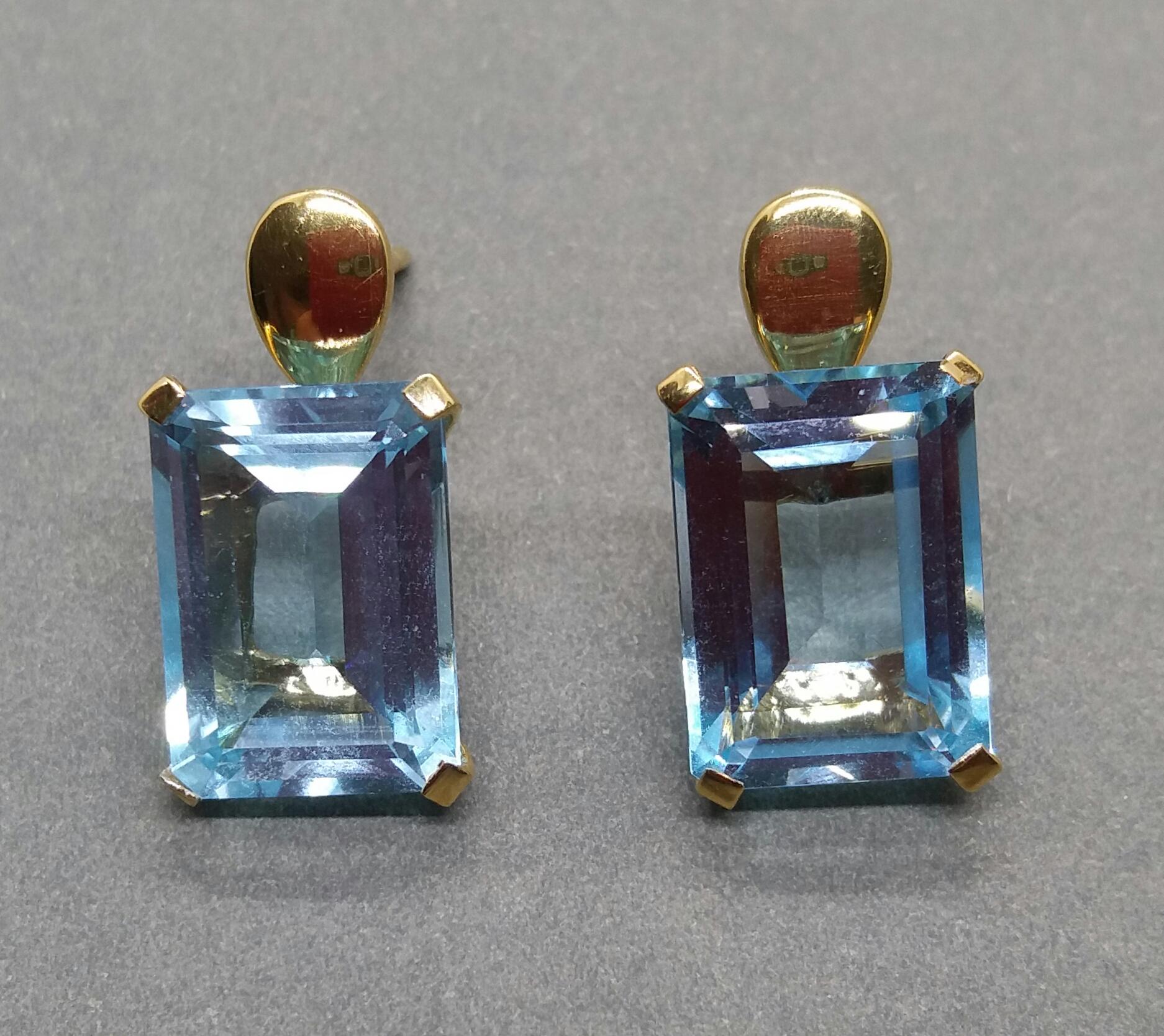 Contemporary Faceted Octagon Shape Blue Topaz 14 Karat Yellow Gold Stud Earrings For Sale