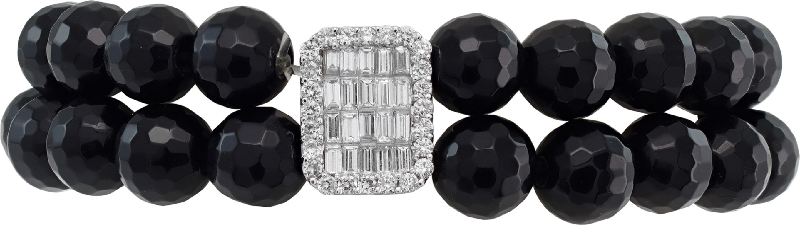 Faceted onyx bead stretch bracelet with center diamond and 18k white gold center station. Approx. 1.00 carat in round and baguette brilliant cut, G-H color, VS clarity diamonds.