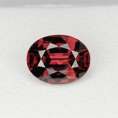 Faceted oval red zircon, 7.08 cts