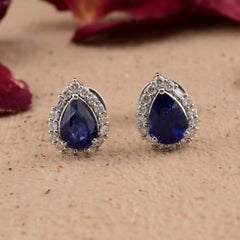 Faceted Pear Blue Sapphire Diamond Halo Stud Earrings 18 Karat White Gold