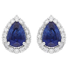Pendientes facetados de zafiro azul pera con halo de diamantes Oro blanco de 18 quilates