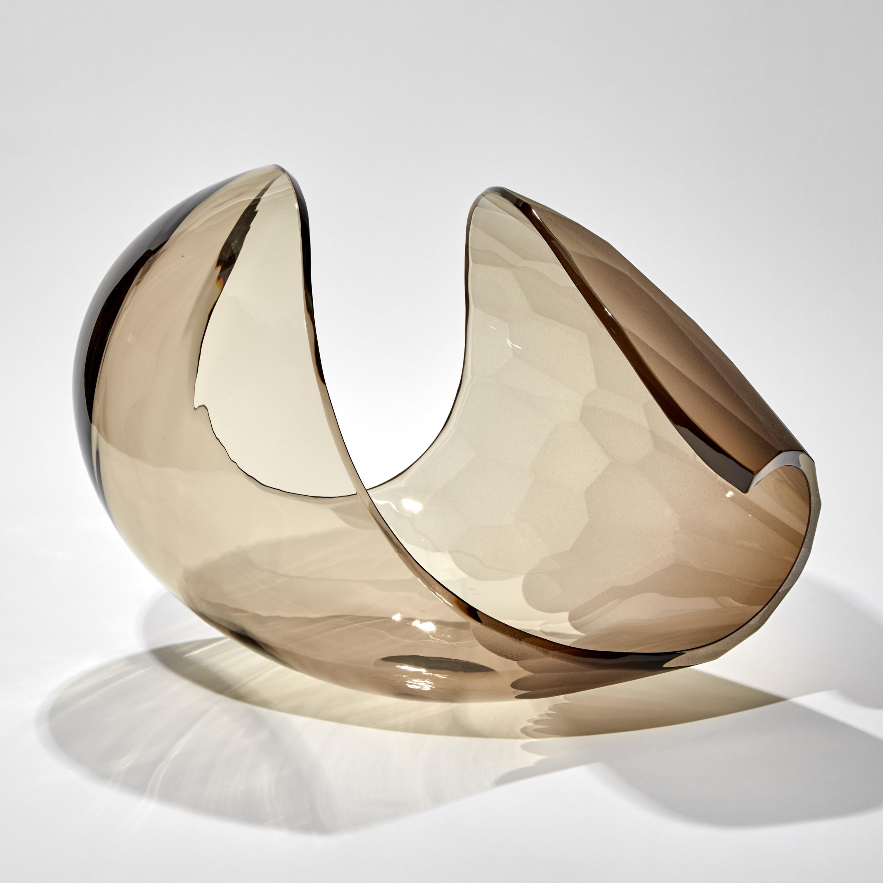 'Faceted Planet in Bronze' is a unique artwork by the Swedish artist and designer, Lena Bergström. It is from an ongoing collection of works called 'Planets', which Bergström has revisited several times throughout her extensive and highly revered