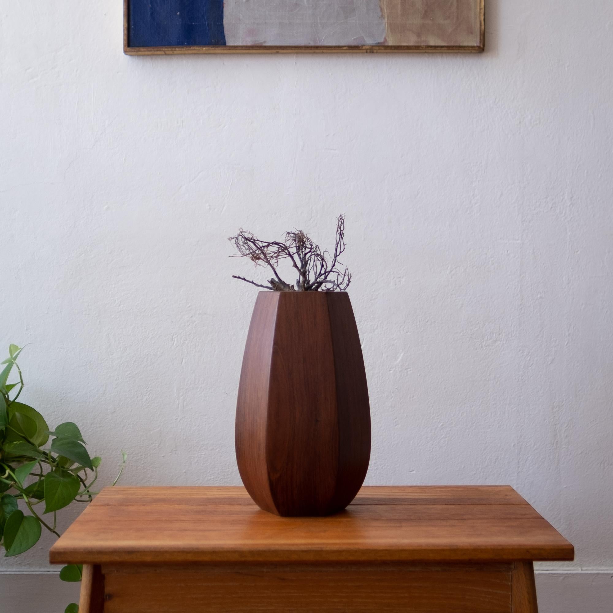 Expertly crafted rosewood vase from Denmark. Plastic lined interior, 1950s.